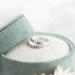 Sterling silver "I Am Charlie" tribute ring with cross, honoring Charlie Kirk, in a green velvet ring box with white flowers.
